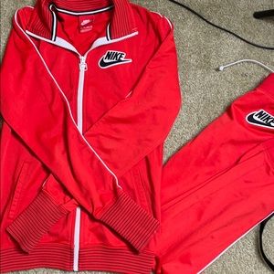 Red Nike sweat suit